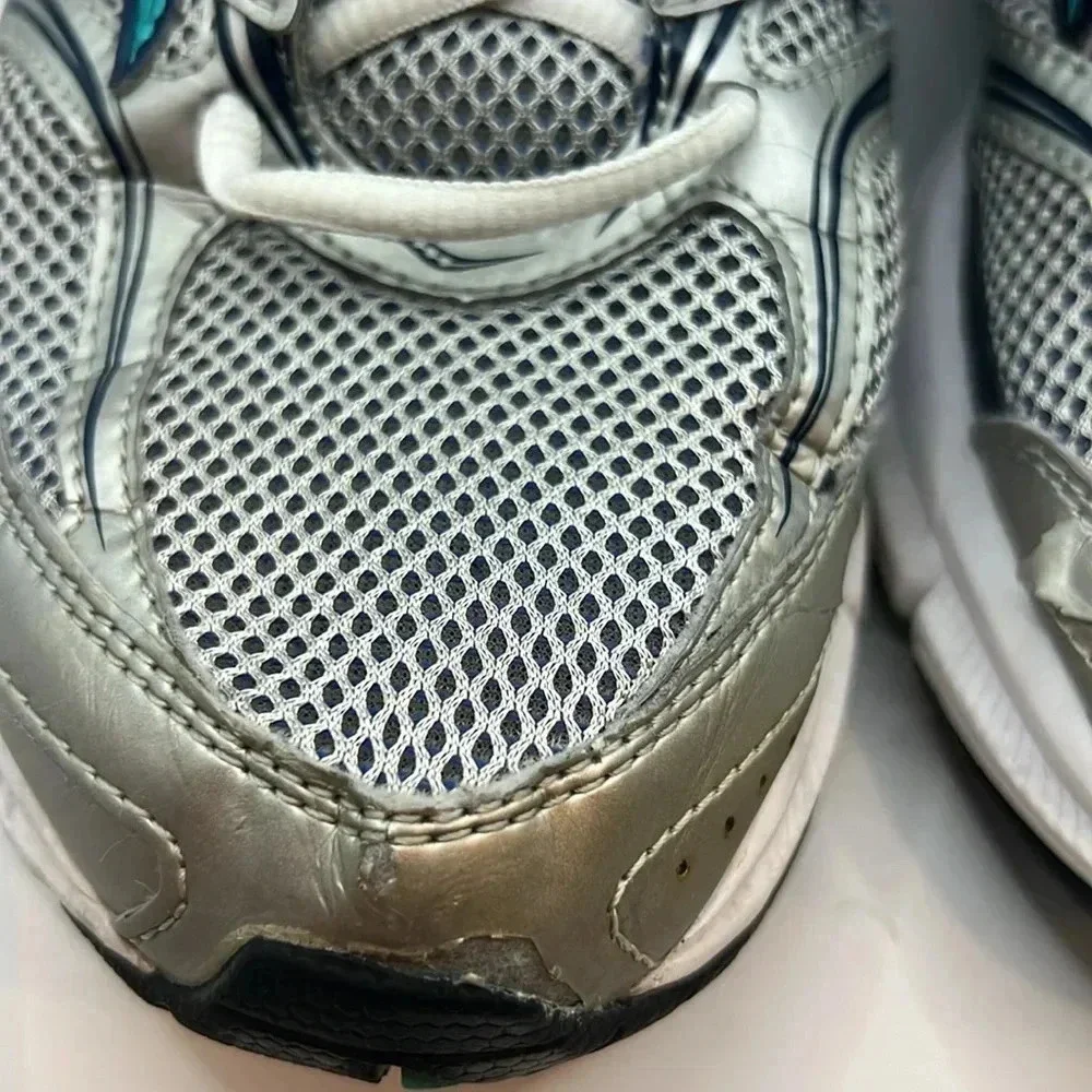 Saucony Cohesion‎ 9 women’s silver blue running shoes sneakers Sz 10 comfort run